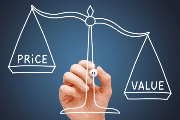 A hand is drawing a balance scale on a blue background. One side of the scale has the word "PRICE," while the other side has the word "VALUE." The image, often used by Melbourne Accounting Firm professionals, highlights the concept of balancing cost versus benefit.