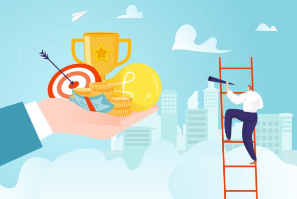 Illustration of a person on a red ladder, using a telescope while holding a paper airplane. In the foreground, a giant hand holds a target with arrows, a trophy, coins, and gear. City buildings in the background with a blue sky and clouds.